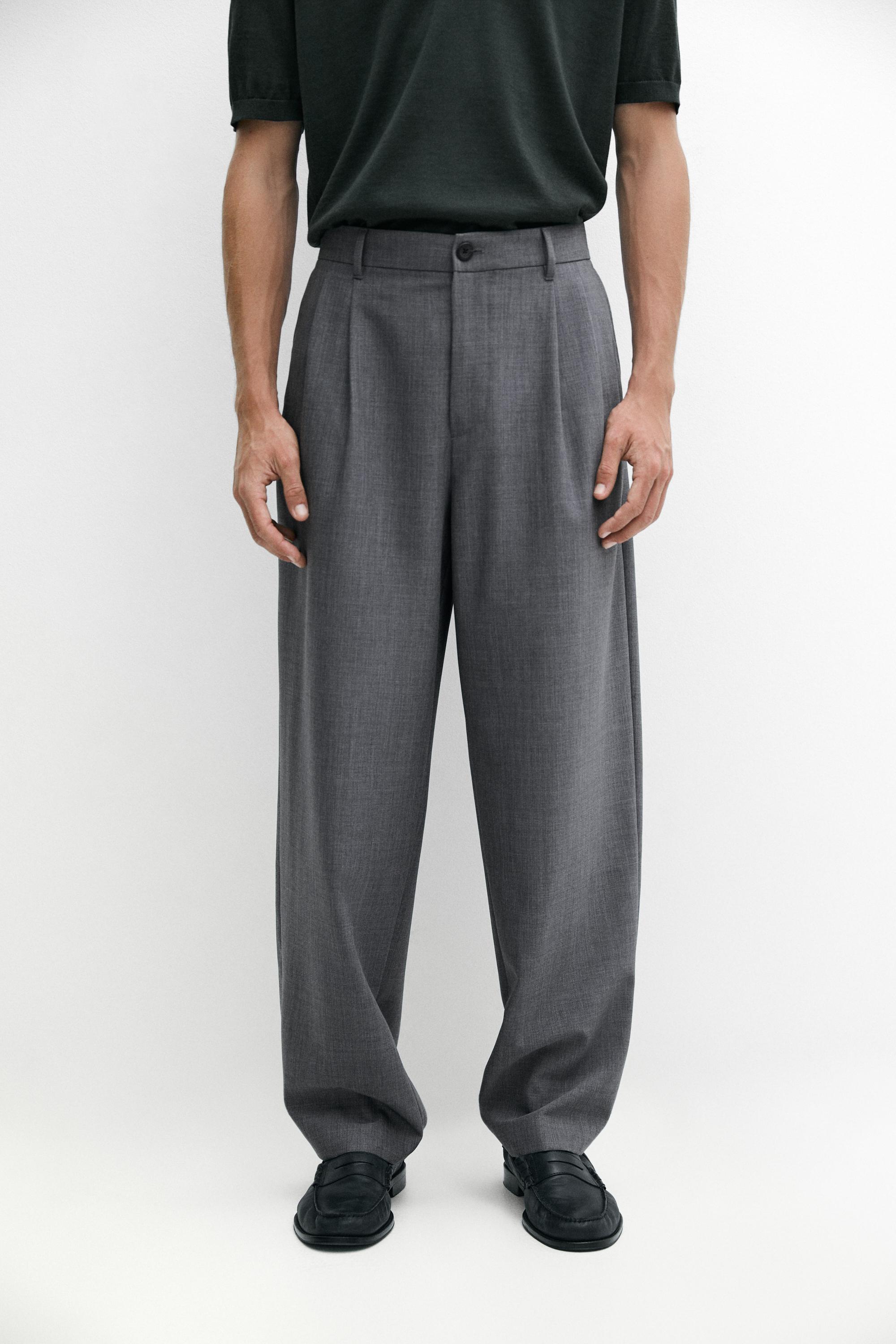 Pantalon relaxed fit à pinces en laine froide